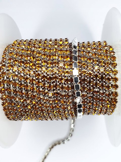 Łańcuszek taśma z kryształkami 2mm 30 cm Topaz AA22 Łańcuszek taśma z kryształkami 2mm 30 cm Topaz AA22