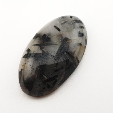 Kwarc z turmalinem kaboszon 32x18 mm nr 53 Kwarc z turmalinem kaboszon 32x18 mm nr 53