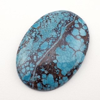 Magnezyt turkusowy kaboszon 33x23 mm nr 66