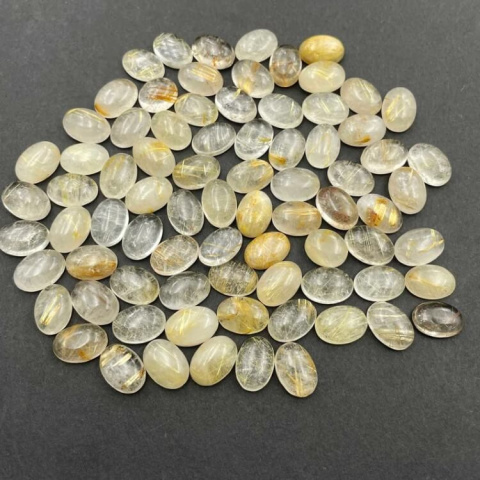 Kwarc z rutylem kaboszon 10x8 mm 1 szt Kwarc z rutylem kaboszon 10x8 mm 1 szt