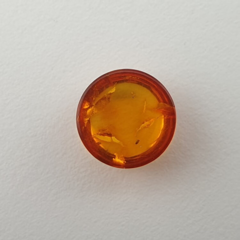 Bursztyn bałtycki kaboszon fi 10 mm nr 582 Bursztyn bałtycki kaboszon fi 10 mm nr 582
